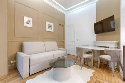Coin salon dans l'établissement MyKeypers Luxury Parisian Flat - Heart of Paris