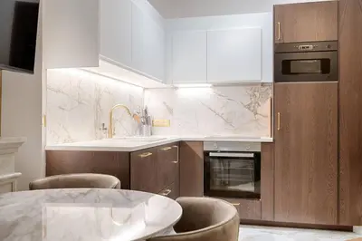 Cuisine ou kitchenette dans l'établissement MyKeypers Luxury Parisian Flat - Heart of Paris
