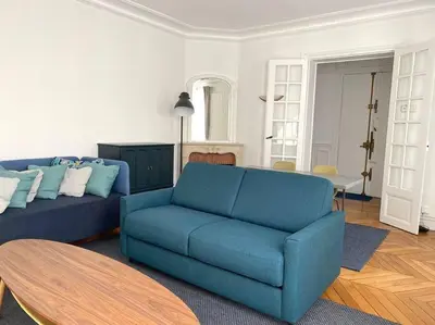 Coin salon dans l'établissement Mytripinparis - Large and Sunbathed 1Br - close to the Eiffel Tower