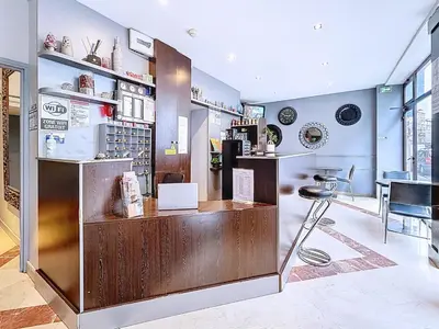 Cuisine ou kitchenette dans l'établissement HOTEL WATTIGNIES