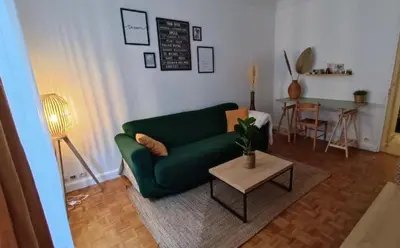 Coin salon dans l'établissement Appartement au coeur de paris à 1 kilomètre de la Tour Eiffel