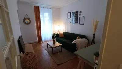 Coin salon dans l'établissement Appartement au coeur de paris à 1 kilomètre de la Tour Eiffel