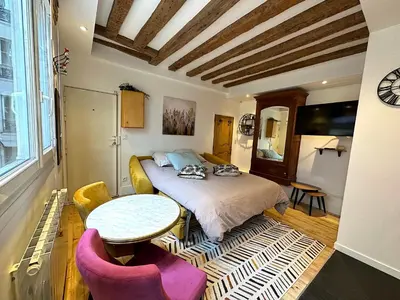Un ou plusieurs lits dans un hébergement de l'établissement Mytripinparis - Fully renovated studio historical Paris