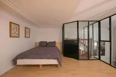 Un ou plusieurs lits dans un hébergement de l'établissement Love in marais