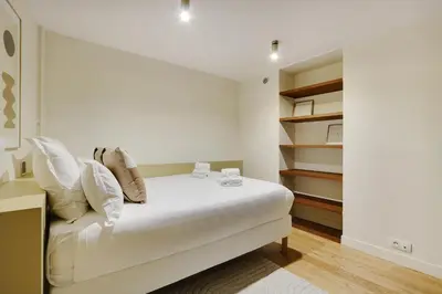 Un ou plusieurs lits dans un hébergement de l'établissement Pick A Flat's Apartment in Saint-Germain - Rue de Sèvres