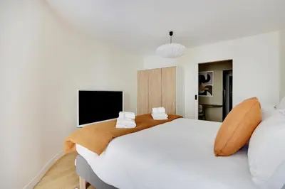 Un ou plusieurs lits dans un hébergement de l'établissement Pick A Flat's Apartment in Saint-Germain - Rue de Sèvres