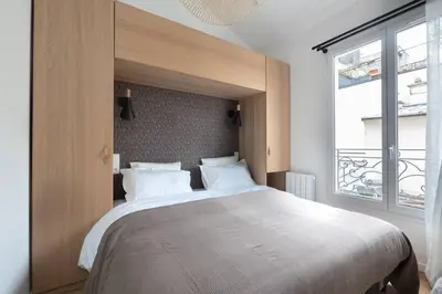 Un ou plusieurs lits dans un hébergement de l'établissement Duplex 4 pax- cour privée