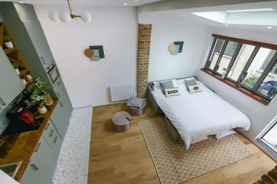 Un ou plusieurs lits dans un hébergement de l'établissement Duplex 4 pax- cour privée