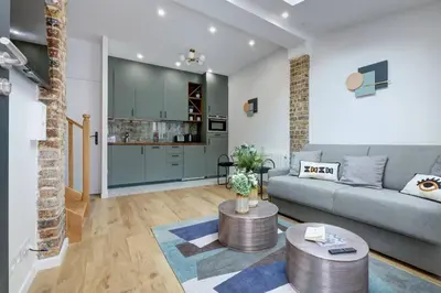 Coin salon dans l'établissement Duplex 4 pax- cour privée