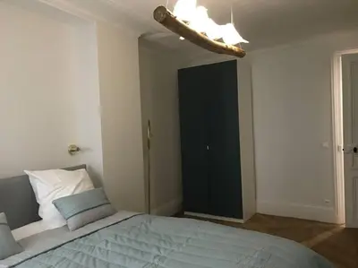 Un ou plusieurs lits dans un hébergement de l'établissement Amazing 6 pax place near Opera