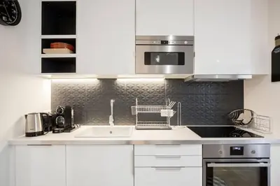 Cuisine ou kitchenette dans l'établissement Amazing 6 pax place near Opera