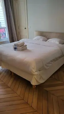 Un ou plusieurs lits dans un hébergement de l'établissement Amazing 6 pax place near Opera