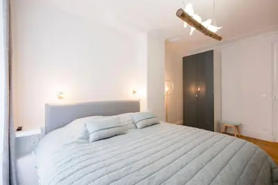 Un ou plusieurs lits dans un hébergement de l'établissement Amazing 6 pax place near Opera