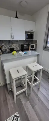 Cuisine ou kitchenette dans l'établissement LOGEMENT CLICHY