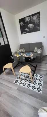 Coin salon dans l'établissement LOGEMENT CLICHY