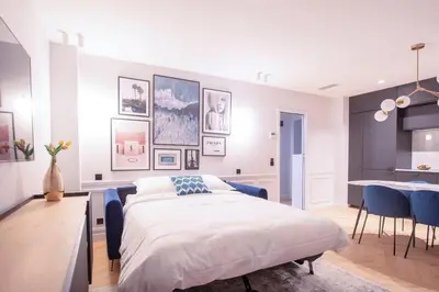 Un ou plusieurs lits dans un hébergement de l'établissement Chic & Fully-Equipped Apartment in Le Marais