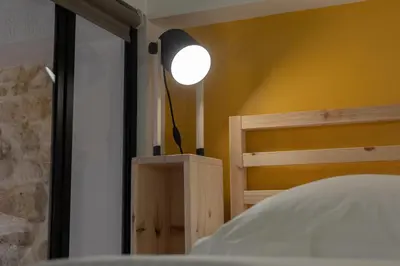 Un ou plusieurs lits dans un hébergement de l'établissement Chloé - Modern Loft Sorbonne Notre-Dame Historic