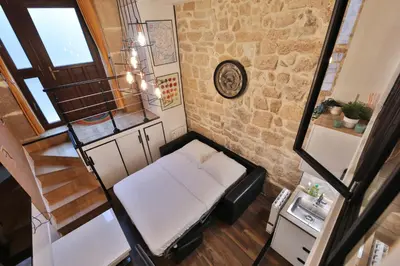 Un ou plusieurs lits dans un hébergement de l'établissement Chloé - Modern Loft Sorbonne Notre-Dame Historic