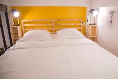 Un ou plusieurs lits dans un hébergement de l'établissement Chloé - Modern Loft Sorbonne Notre-Dame Historic