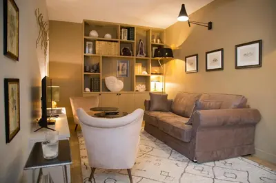 Coin salon dans l'établissement Célestine - Luxury Duplex Saint-Michel Luxembourg Gardens