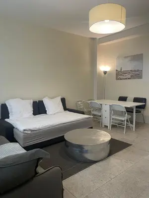Coin salon dans l'établissement Chemin Vert