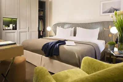 Un ou plusieurs lits dans un hébergement de l'établissement Hôtel Le Marianne