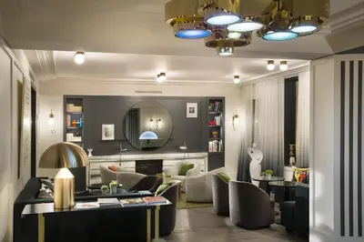Coin salon dans l'établissement Hôtel Le Marianne