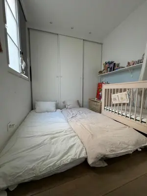 Un ou plusieurs lits dans un hébergement de l'établissement South Pigalle - 2 bedrooms luxury flat