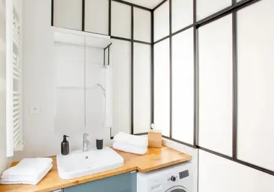 Cuisine ou kitchenette dans l'établissement Charmant appartement près du Père Lachaise