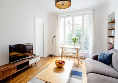 Télévision ou salle de divertissement dans l'établissement Charmant appartement près du Père Lachaise
