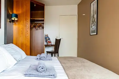 Un ou plusieurs lits dans un hébergement de l'établissement Chambre d'Amis - Chambres d'Hôtes-B&B-Guest House