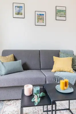 Coin salon dans l'établissement Imhost -Élégant appt Tolbiac 4 pers