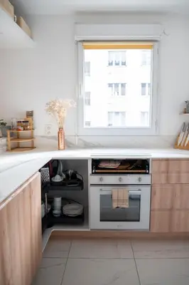 Cuisine ou kitchenette dans l'établissement Appartement entier avec balcon sur cour à Paris