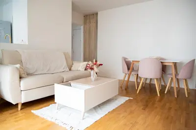 Coin salon dans l'établissement Appartement entier avec balcon sur cour à Paris