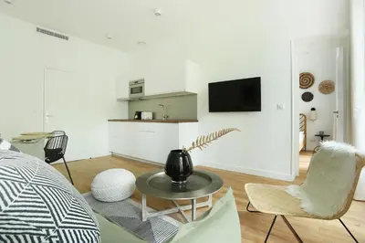 Télévision ou salle de divertissement dans l'établissement Apartment Center of Paris by Studio prestige