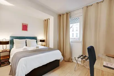 Un ou plusieurs lits dans un hébergement de l'établissement Charming FLAT - Père Lachaise