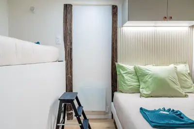 Un ou plusieurs lits dans un hébergement de l'établissement Lavie Maison AC & Jacuzzi
