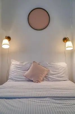 Un ou plusieurs lits dans un hébergement de l'établissement Charming appartment Paris Montmartre