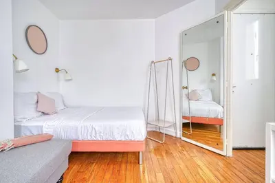 Un ou plusieurs lits dans un hébergement de l'établissement Charming appartment Paris Montmartre