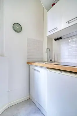 Cuisine ou kitchenette dans l'établissement Charming appartment Paris Montmartre