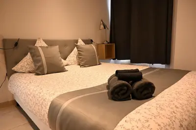 Un ou plusieurs lits dans un hébergement de l'établissement Appart cosy et fonctionnel, quartier très sympa
