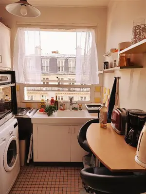 Cuisine ou kitchenette dans l'établissement Studio COSY et SPACIEUX AVEC EMPLACEMENT IDEAL