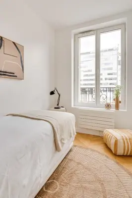 Un ou plusieurs lits dans un hébergement de l'établissement PorteMaillot & La Défense 4 Bedroom 10 people
