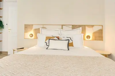Un ou plusieurs lits dans un hébergement de l'établissement Opera Sentier Appartement avec Spa et Cinéma