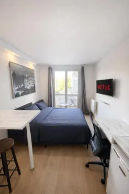 Un ou plusieurs lits dans un hébergement de l'établissement Exclusive Private Apartment by Warilco - Pleyel 25 m2 - À 1 minute de la station métro Carrefour Pleyel