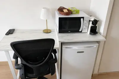 Cuisine ou kitchenette dans l'établissement Exclusive Private Apartment by Warilco - Pleyel 25 m2 - À 1 minute de la station métro Carrefour Pleyel