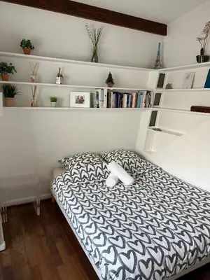 Un ou plusieurs lits dans un hébergement de l'établissement Appartement cosy près du Panthéon