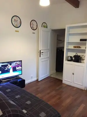 Cuisine ou kitchenette dans l'établissement Appartement cosy près du Panthéon