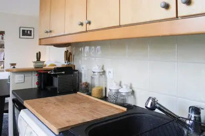 Cuisine ou kitchenette dans l'établissement 26 m love cocoon with Eiffel Tower view