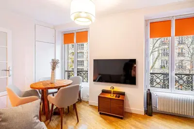 Télévision ou salle de divertissement dans l'établissement GuestReady - Serene Comfort near Sacré-Cœur